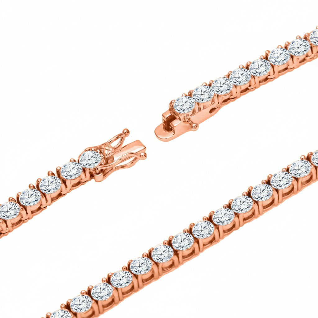 Rose gold bracelet with clear gemstones on a white background