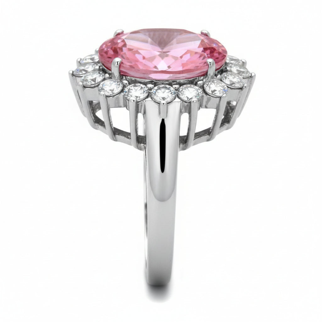 Ring with pink gemstone and diamond-like stones on a white background