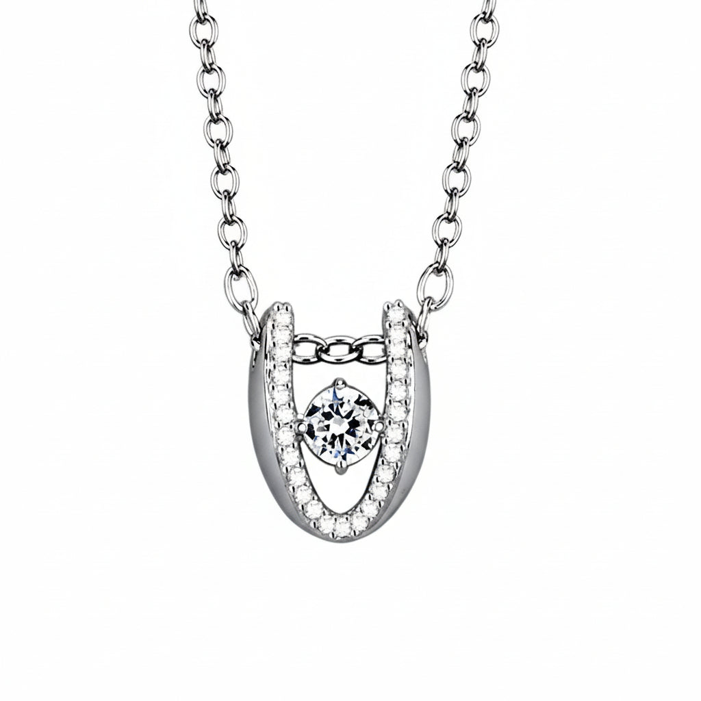 Silver horseshoe pendant with central gemstone and measurements on a white background