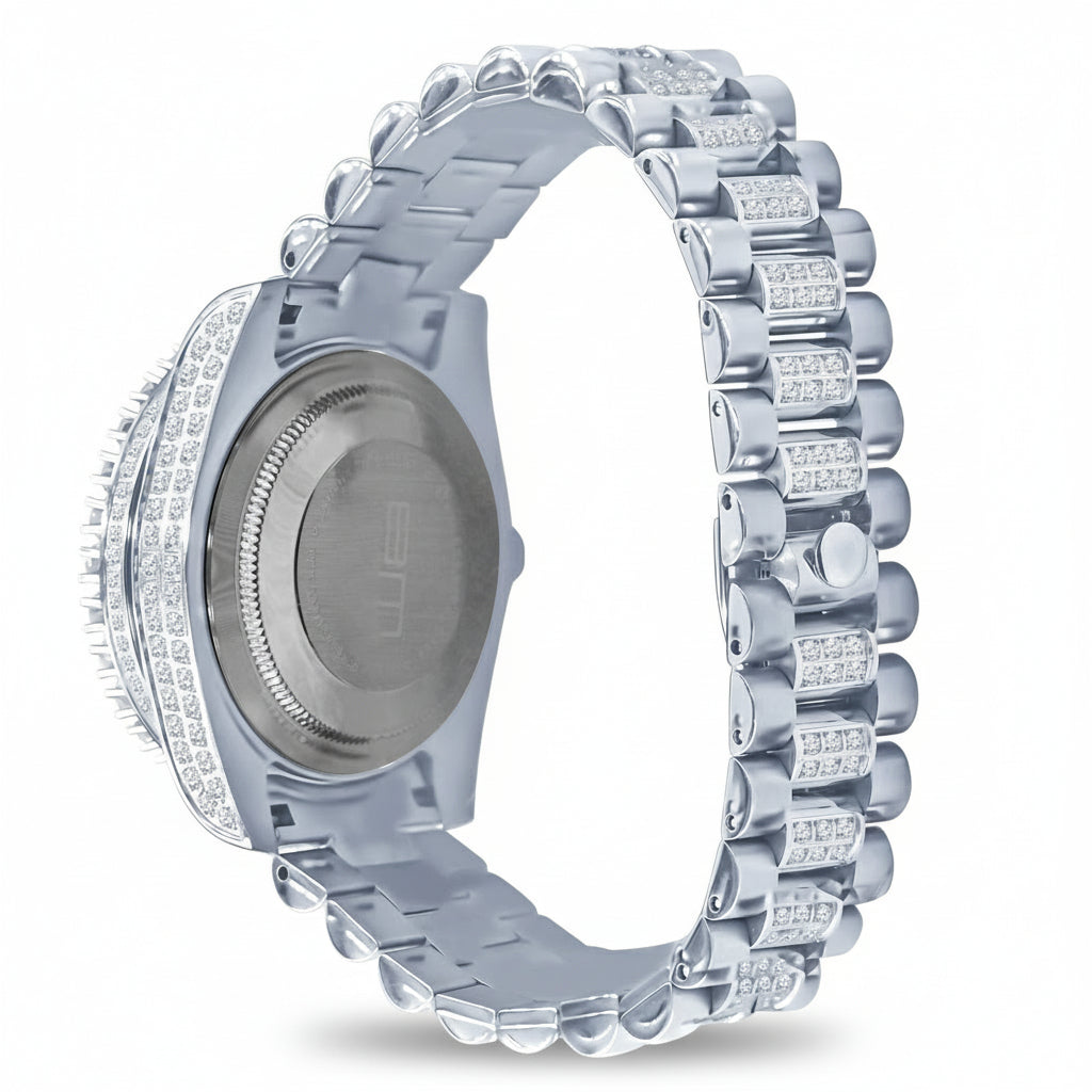 Silver watch with a diamond-studded band on a white background