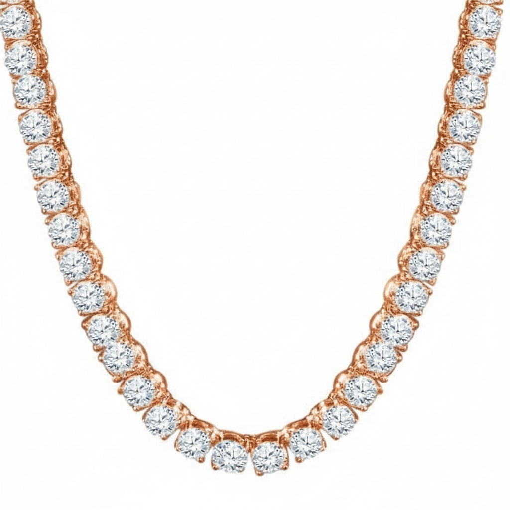 Rose gold necklace with clear gemstones on a white background