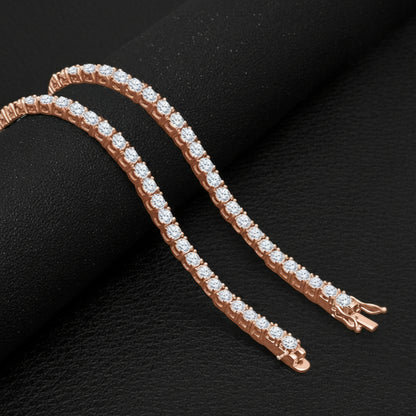 Rose gold bracelet with diamonds on a black background
