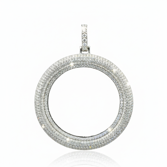 Silver circular pendant with multiple rows of diamonds on a white background
