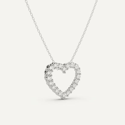 Heart-shaped diamond necklace on a light gray background
