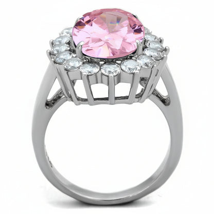 Ring with a pink gemstone and clear stones on a white background