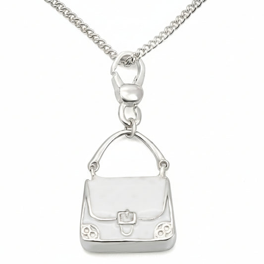 Silver handbag pendant on a chain against a white background