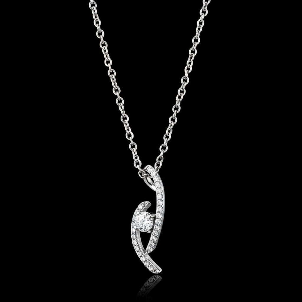 Silver necklace with a heart-shaped pendant on a black background